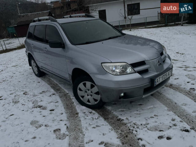 Сірий Міцубісі Аутлендер, об'ємом двигуна 2 л та пробігом 238 тис. км за 5600 $, фото 1 на Automoto.ua