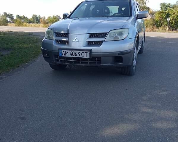 Мицубиси Аутлендер 2005 в Нежине на Automoto.ua Серый Мицубиси Аутлендер, объемом двигателя 2.38 л и пробегом 300 тыс. км за 4999 $, фото 1 на Automoto.ua