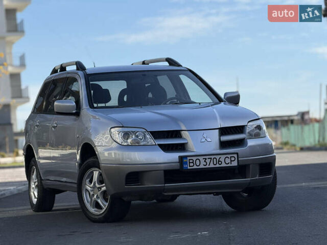 Сірий Міцубісі Аутлендер, об'ємом двигуна 2 л та пробігом 235 тис. км за 5200 $, фото 1 на Automoto.ua