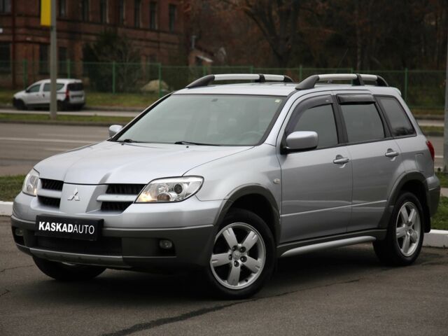 Серый Мицубиси Аутлендер, объемом двигателя 2.4 л и пробегом 171 тыс. км за 8200 $, фото 1 на Automoto.ua