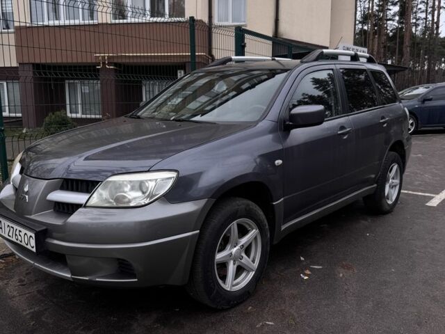 Сірий Міцубісі Аутлендер, об'ємом двигуна 2 л та пробігом 310 тис. км за 5200 $, фото 1 на Automoto.ua