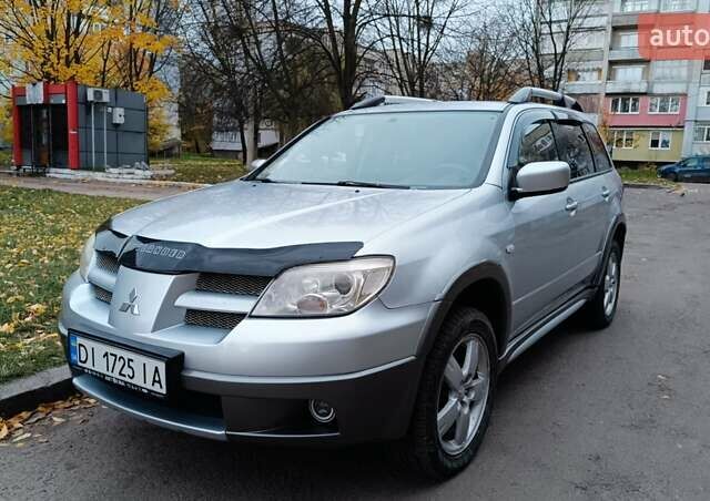 Сірий Міцубісі Аутлендер, об'ємом двигуна 2 л та пробігом 312 тис. км за 8300 $, фото 1 на Automoto.ua