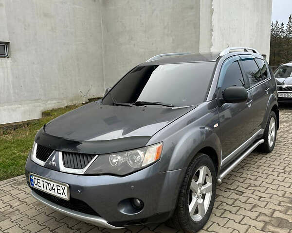 Сірий Міцубісі Аутлендер, об'ємом двигуна 2.36 л та пробігом 380 тис. км за 10000 $, фото 1 на Automoto.ua