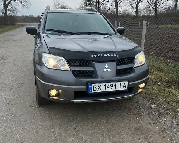 Сірий Міцубісі Аутлендер, об'ємом двигуна 2 л та пробігом 280 тис. км за 7200 $, фото 1 на Automoto.ua