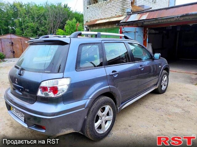 Сірий Міцубісі Аутлендер, об'ємом двигуна 2.4 л та пробігом 75 тис. км за 8000 $, фото 1 на Automoto.ua