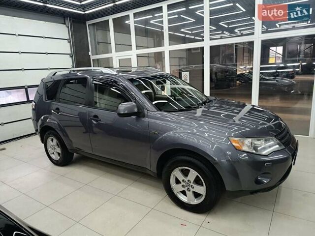 Сірий Міцубісі Аутлендер, об'ємом двигуна 2.36 л та пробігом 214 тис. км за 8500 $, фото 1 на Automoto.ua