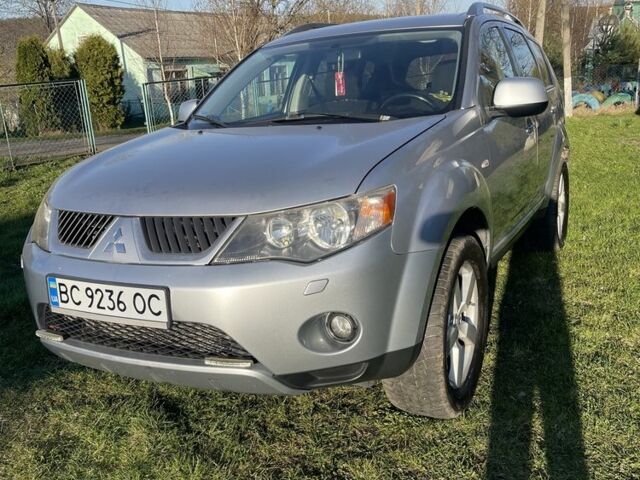 Сірий Міцубісі Аутлендер, об'ємом двигуна 2 л та пробігом 330 тис. км за 7700 $, фото 1 на Automoto.ua