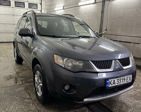 Сірий Міцубісі Аутлендер, об'ємом двигуна 2.36 л та пробігом 190 тис. км за 7700 $, фото 1 на Automoto.ua