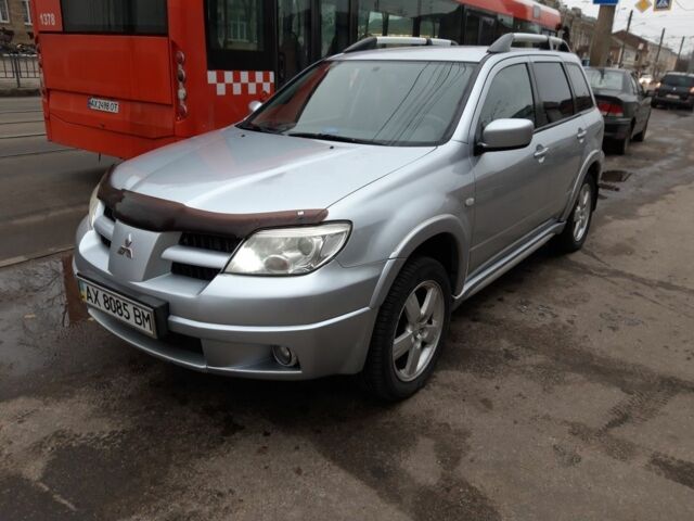 Сірий Міцубісі Аутлендер, об'ємом двигуна 2.4 л та пробігом 190 тис. км за 6000 $, фото 1 на Automoto.ua