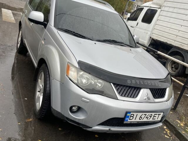 Серый Мицубиси Аутлендер, объемом двигателя 0 л и пробегом 319 тыс. км за 6900 $, фото 1 на Automoto.ua