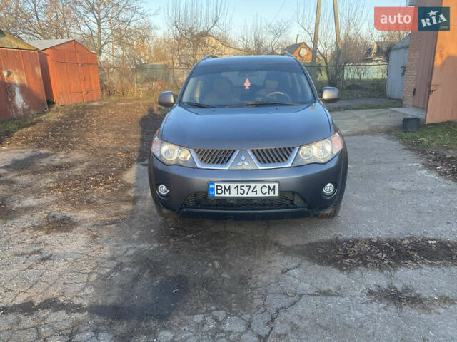 Серый Мицубиси Аутлендер, объемом двигателя 1.97 л и пробегом 257 тыс. км за 9000 $, фото 1 на Automoto.ua