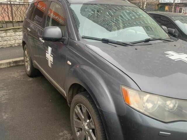 Серый Мицубиси Аутлендер, объемом двигателя 2 л и пробегом 250 тыс. км за 6000 $, фото 1 на Automoto.ua