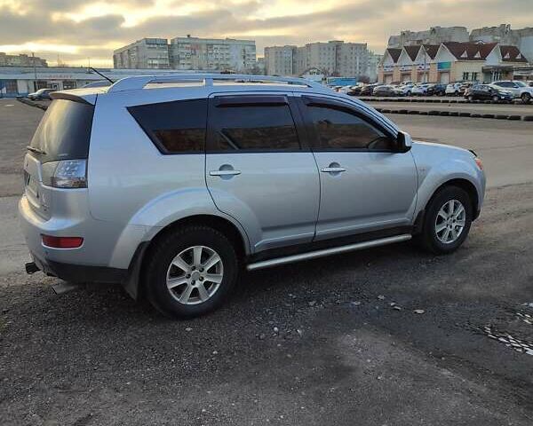 Сірий Міцубісі Аутлендер, об'ємом двигуна 2.4 л та пробігом 196 тис. км за 10000 $, фото 1 на Automoto.ua