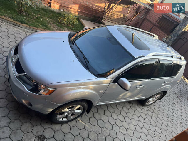 Сірий Міцубісі Аутлендер, об'ємом двигуна 2.36 л та пробігом 195 тис. км за 9500 $, фото 1 на Automoto.ua