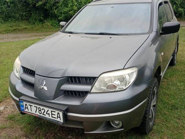 Сірий Міцубісі Аутлендер, об'ємом двигуна 2 л та пробігом 208 тис. км за 6000 $, фото 1 на Automoto.ua