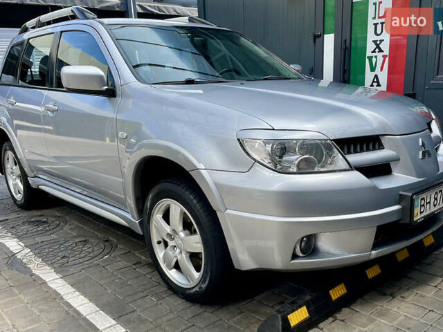Сірий Міцубісі Аутлендер, об'ємом двигуна 2 л та пробігом 130 тис. км за 8500 $, фото 1 на Automoto.ua