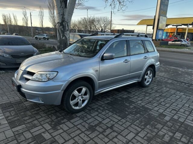 Сірий Міцубісі Аутлендер, об'ємом двигуна 2.4 л та пробігом 190 тис. км за 6900 $, фото 1 на Automoto.ua