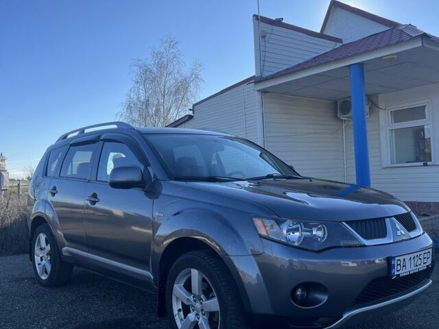 Серый Мицубиси Аутлендер, объемом двигателя 2.4 л и пробегом 213 тыс. км за 7800 $, фото 1 на Automoto.ua
