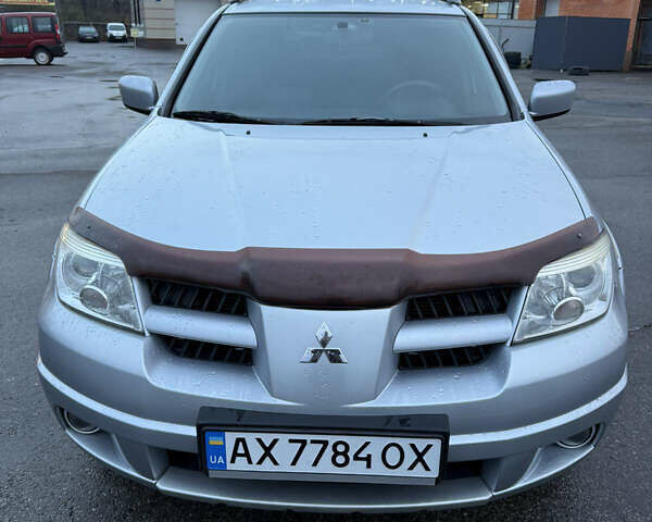 Сірий Міцубісі Аутлендер, об'ємом двигуна 2.4 л та пробігом 190 тис. км за 7500 $, фото 1 на Automoto.ua