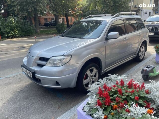 Сірий Міцубісі Аутлендер, об'ємом двигуна 2.4 л та пробігом 251 тис. км за 7600 $, фото 1 на Automoto.ua