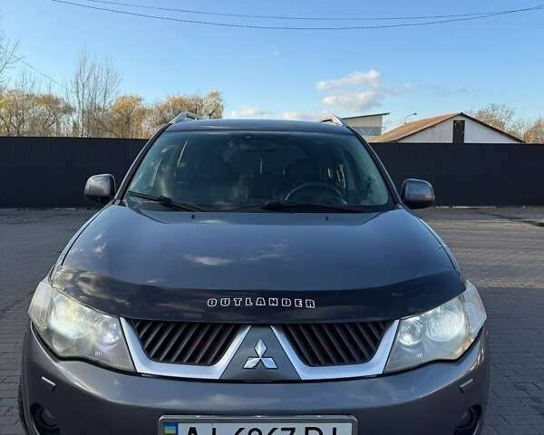 Серый Мицубиси Аутлендер, объемом двигателя 2.18 л и пробегом 287 тыс. км за 10200 $, фото 1 на Automoto.ua