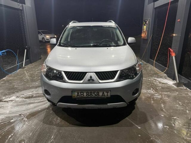 Серый Мицубиси Аутлендер, объемом двигателя 2.4 л и пробегом 208 тыс. км за 7600 $, фото 1 на Automoto.ua