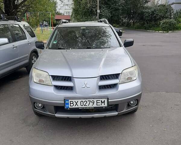 Сірий Міцубісі Аутлендер, об'ємом двигуна 2 л та пробігом 309 тис. км за 6950 $, фото 1 на Automoto.ua
