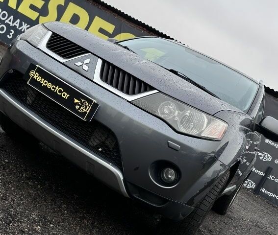 Серый Мицубиси Аутлендер, объемом двигателя 2 л и пробегом 339 тыс. км за 4949 $, фото 1 на Automoto.ua