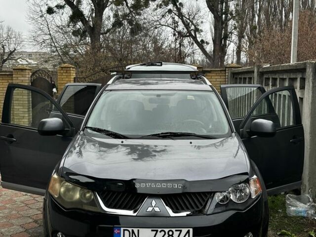 Сірий Міцубісі Аутлендер, об'ємом двигуна 2.4 л та пробігом 265 тис. км за 7000 $, фото 1 на Automoto.ua