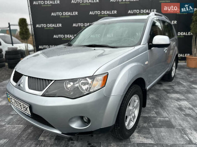 Серый Мицубиси Аутлендер, объемом двигателя 2.4 л и пробегом 61 тыс. км за 11300 $, фото 1 на Automoto.ua