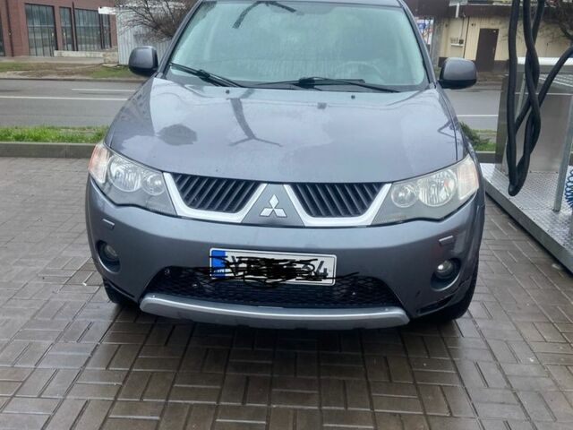 Сірий Міцубісі Аутлендер, об'ємом двигуна 2 л та пробігом 330 тис. км за 4950 $, фото 1 на Automoto.ua