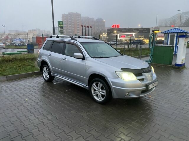 Сірий Міцубісі Аутлендер, об'ємом двигуна 2.4 л та пробігом 299 тис. км за 6300 $, фото 1 на Automoto.ua