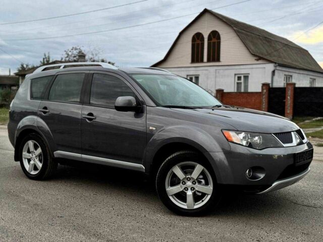 Серый Мицубиси Аутлендер, объемом двигателя 2.4 л и пробегом 171 тыс. км за 9199 $, фото 1 на Automoto.ua