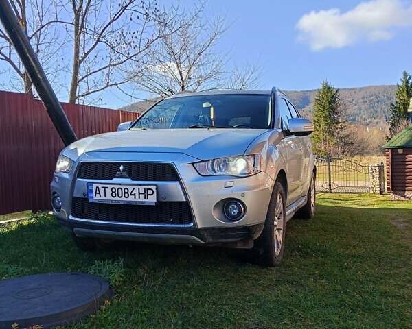 Серый Мицубиси Аутлендер, объемом двигателя 2.2 л и пробегом 236 тыс. км за 10500 $, фото 1 на Automoto.ua