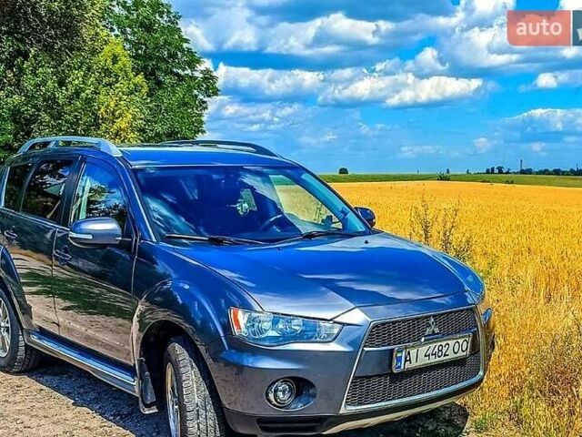 Сірий Міцубісі Аутлендер, об'ємом двигуна 2.2 л та пробігом 240 тис. км за 10900 $, фото 1 на Automoto.ua