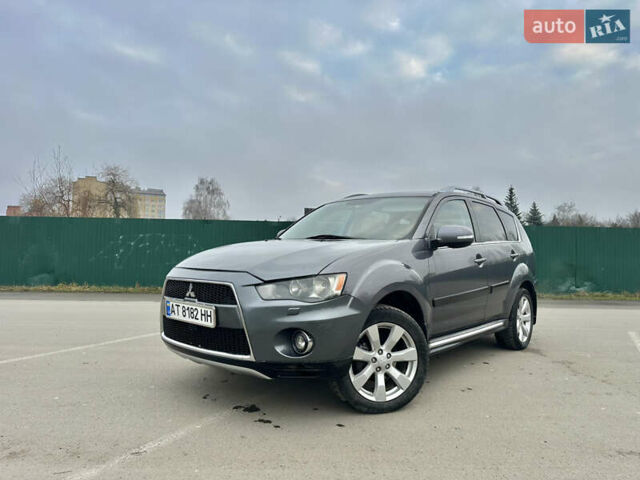 Серый Мицубиси Аутлендер, объемом двигателя 2.4 л и пробегом 270 тыс. км за 8450 $, фото 1 на Automoto.ua