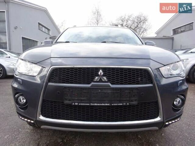 Серый Мицубиси Аутлендер, объемом двигателя 2.4 л и пробегом 101 тыс. км за 6500 $, фото 1 на Automoto.ua