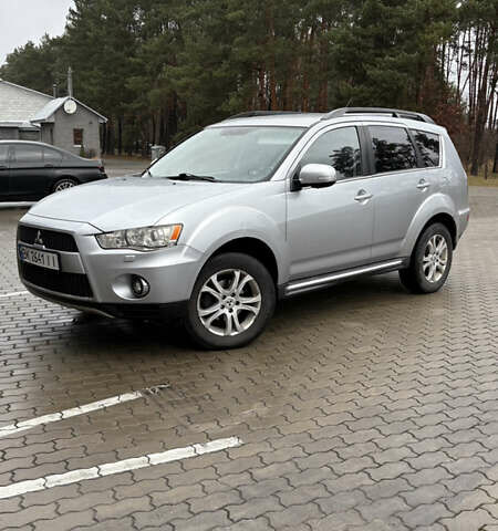 Серый Мицубиси Аутлендер, объемом двигателя 2.18 л и пробегом 233 тыс. км за 11000 $, фото 1 на Automoto.ua