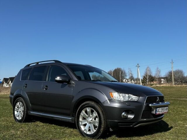 Серый Мицубиси Аутлендер, объемом двигателя 2.2 л и пробегом 202 тыс. км за 11000 $, фото 1 на Automoto.ua