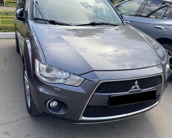 Сірий Міцубісі Аутлендер, об'ємом двигуна 2.2 л та пробігом 220 тис. км за 11500 $, фото 1 на Automoto.ua