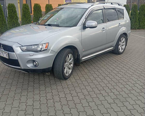 Сірий Міцубісі Аутлендер, об'ємом двигуна 2.18 л та пробігом 239 тис. км за 12000 $, фото 1 на Automoto.ua