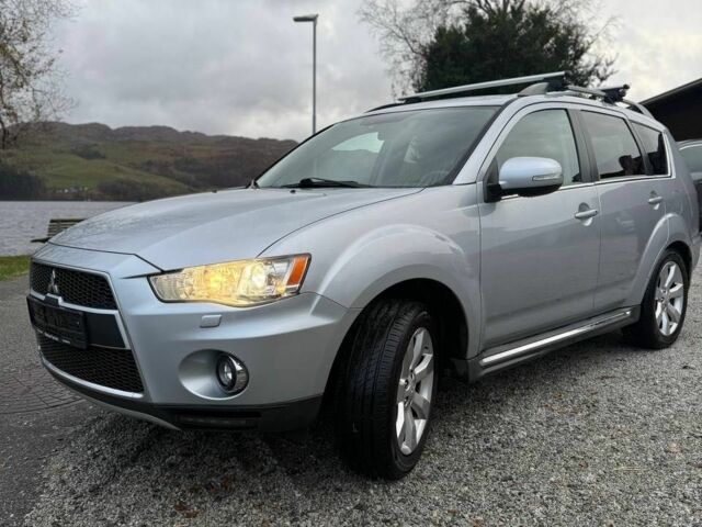 Серый Мицубиси Аутлендер, объемом двигателя 2.3 л и пробегом 279 тыс. км за 4642 $, фото 1 на Automoto.ua
