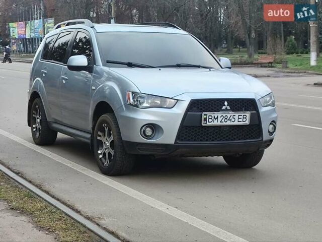 Серый Мицубиси Аутлендер, объемом двигателя 2 л и пробегом 205 тыс. км за 9600 $, фото 1 на Automoto.ua