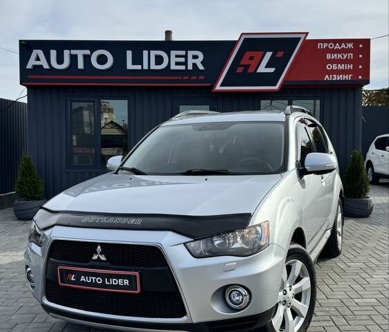 Серый Мицубиси Аутлендер, объемом двигателя 2.4 л и пробегом 239 тыс. км за 11700 $, фото 1 на Automoto.ua
