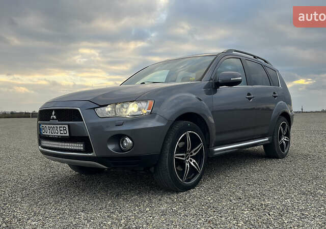 Сірий Міцубісі Аутлендер, об'ємом двигуна 2.2 л та пробігом 280 тис. км за 11100 $, фото 1 на Automoto.ua