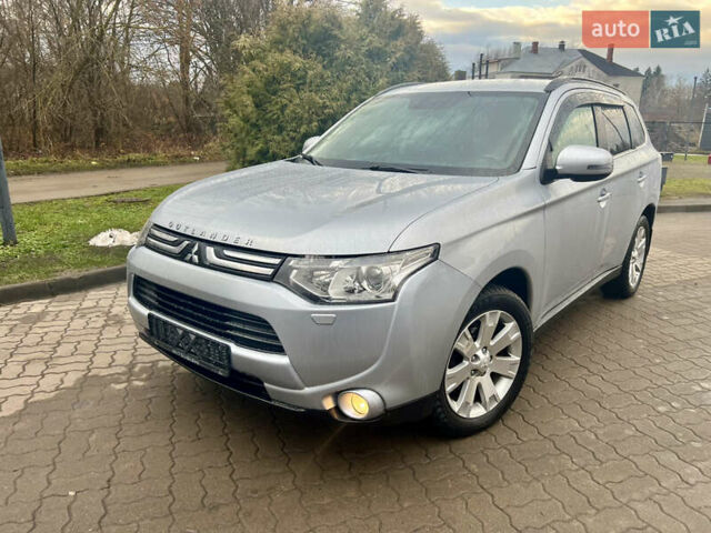 Серый Мицубиси Аутлендер, объемом двигателя 2.2 л и пробегом 224 тыс. км за 13850 $, фото 1 на Automoto.ua
