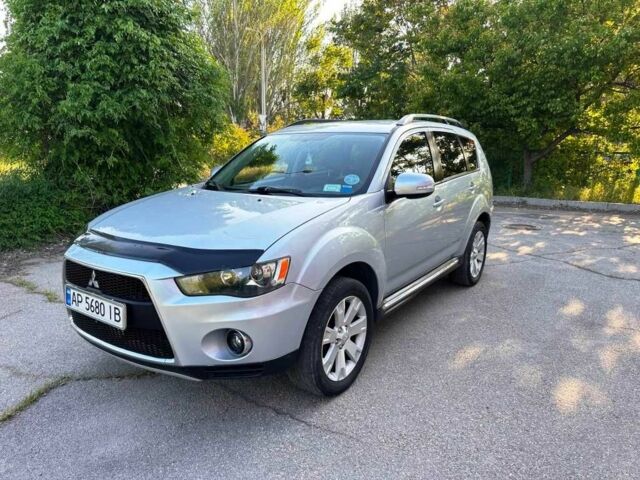 Серый Мицубиси Аутлендер, объемом двигателя 2.4 л и пробегом 219 тыс. км за 11600 $, фото 1 на Automoto.ua