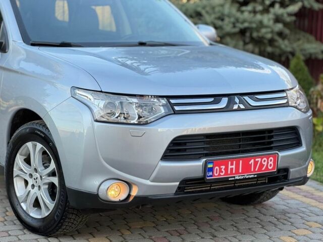 Сірий Міцубісі Аутлендер, об'ємом двигуна 2.3 л та пробігом 190 тис. км за 13800 $, фото 1 на Automoto.ua