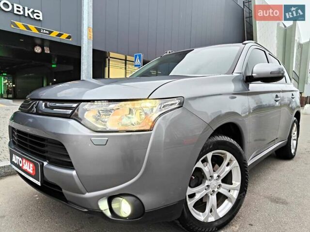 Серый Мицубиси Аутлендер, объемом двигателя 2.4 л и пробегом 209 тыс. км за 10990 $, фото 1 на Automoto.ua