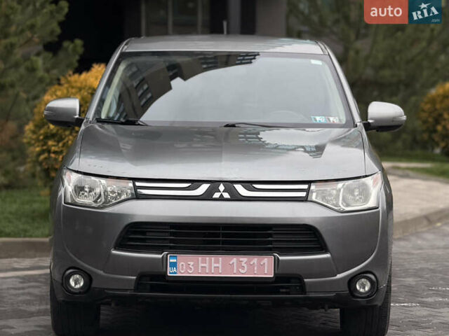 Сірий Міцубісі Аутлендер, об'ємом двигуна 2.4 л та пробігом 190 тис. км за 13000 $, фото 1 на Automoto.ua